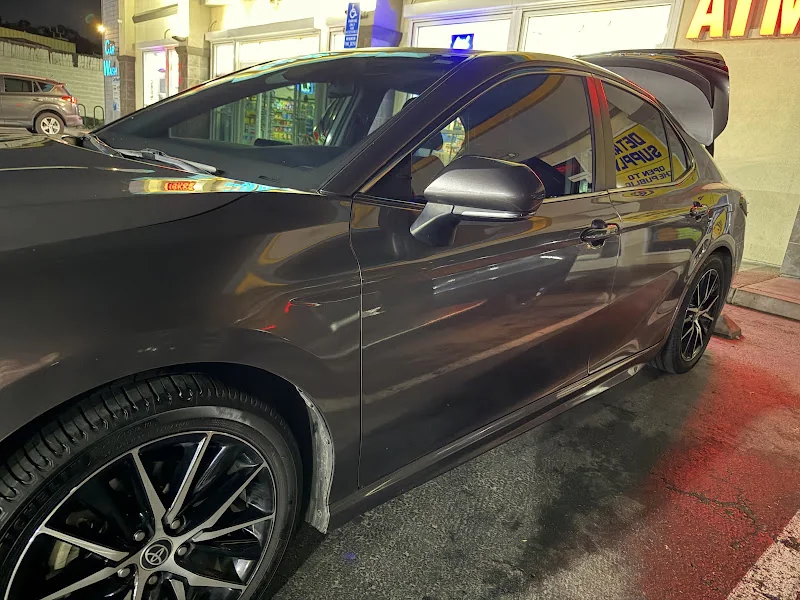 Dark SUV with tinted side windows, photographed by Google reviewer Nancy Pintor