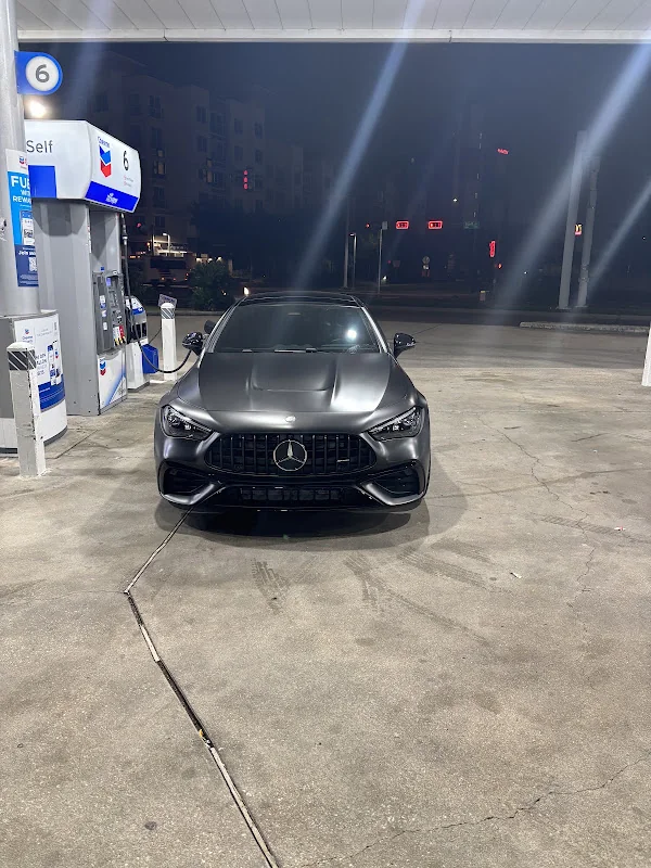 Dark sedan at a fuel station, photographed by Google reviewer solomon falode